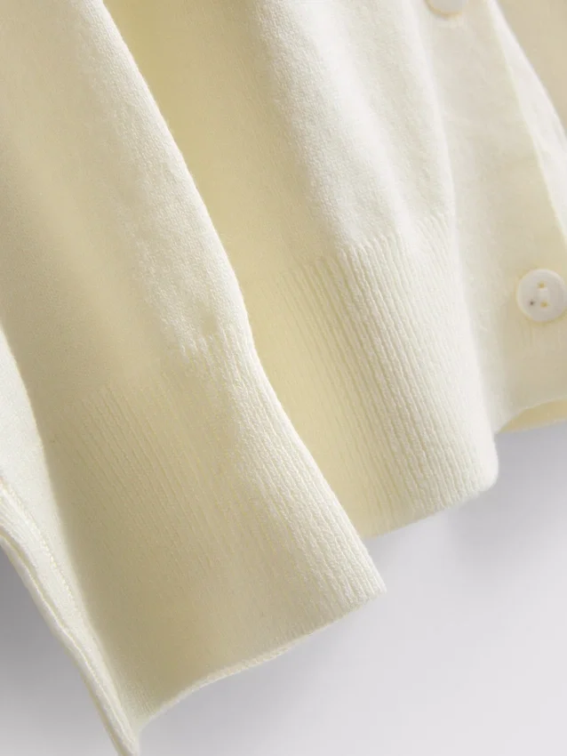 Cardigan básico de cuello redondo