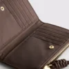 Cartera de muñeca tejida