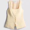Chaleco lila con cuello redondo