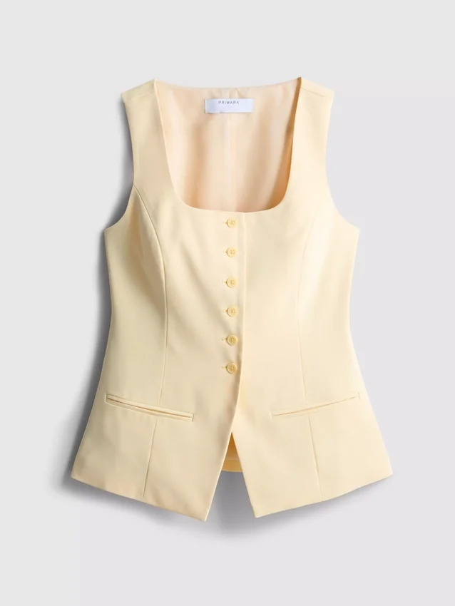 Chaleco lila con cuello redondo