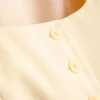 Chaleco lila con cuello redondo