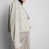 Chaqueta impermeable de corte cuadrado con doble botonadura