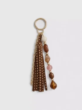 Colgante para bolso con borla y cuentas de Paula Echevarría