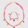 Conjunto de joyas con dijes de frutas
