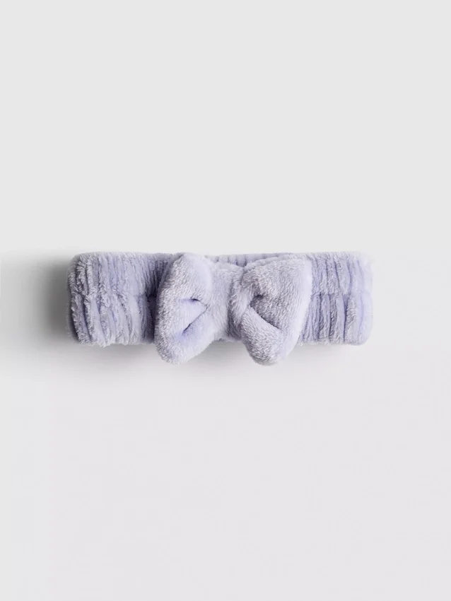 Diadema de felpa con moño