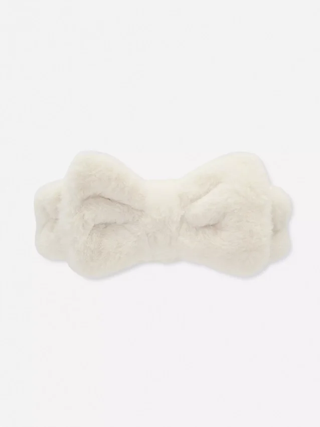 Diadema de felpa con moño