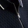 El polo con cremallera texturizada de The Edit
