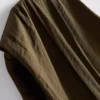 El top drapeado con detalles metálicos de The Edit
