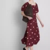El vestido midi de lino con mangas abullonadas de The Edit