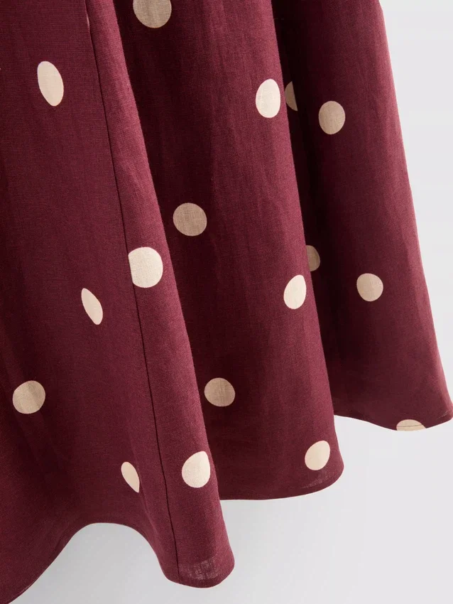 El vestido midi de lino con mangas abullonadas de The Edit