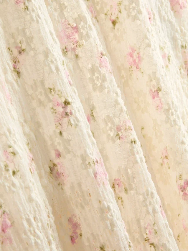 Falda midi floral texturizada de mezcla de algodón
