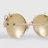 Gafas de sol redondas con detalle floral