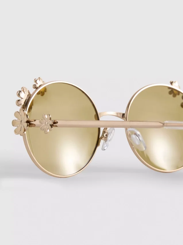 Gafas de sol redondas con detalle floral