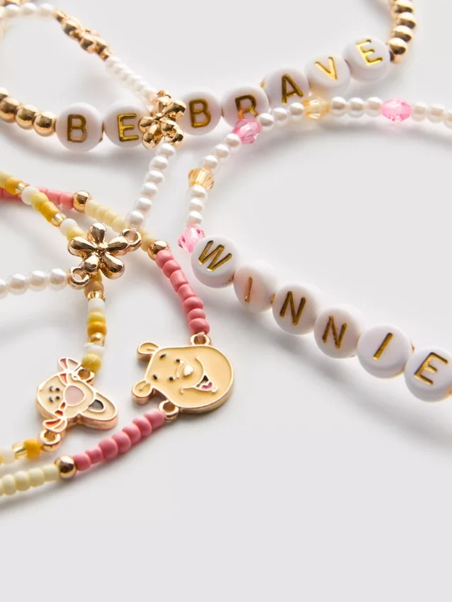 Juego de 5 pulseras con dijes de Disney de Winnie the Pooh