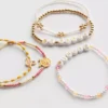 Juego de 5 pulseras con dijes de Disney de Winnie the Pooh
