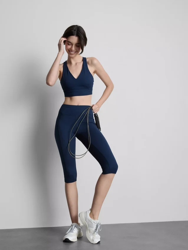 Leggings capri deportivos de cintura alta, lisos y con sujeción
