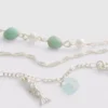 Lote de 3 collares con dijes variados
