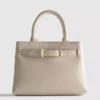 Mini bolso con detalle de hebilla