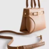 Mini bolso con detalle de hebilla