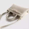Mini bolso con detalle de hebilla