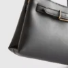 Mini bolso con detalle de hebilla