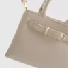 Mini bolso con detalle de hebilla
