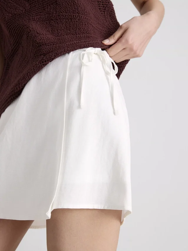 Mini falda-pantalón con lazos laterales de mezcla de lino