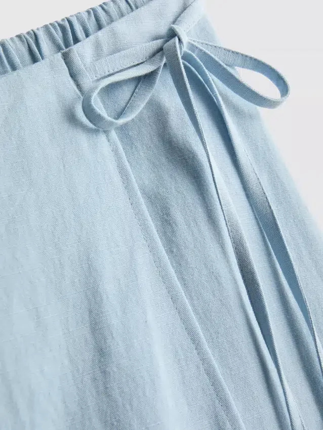 Mini falda-pantalón con lazos laterales de mezcla de lino