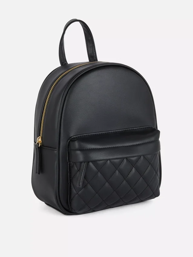 Mini mochila con acolchado en forma de rombos