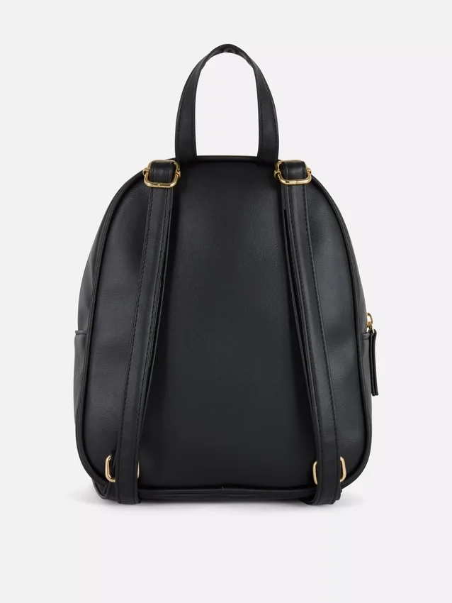Mini mochila con acolchado en forma de rombos