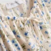 Mini vestido con mangas casquillo arrugadas
