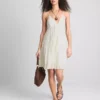 Mini vestido con volantes y ribete de encaje de Paula Echevarría