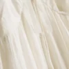 Mini vestido con volantes y ribete de encaje de Paula Echevarría