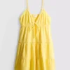 Mini vestido de algodón con cuello en V y volantes