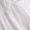 Mini vestido de algodón con cuello en V y volantes