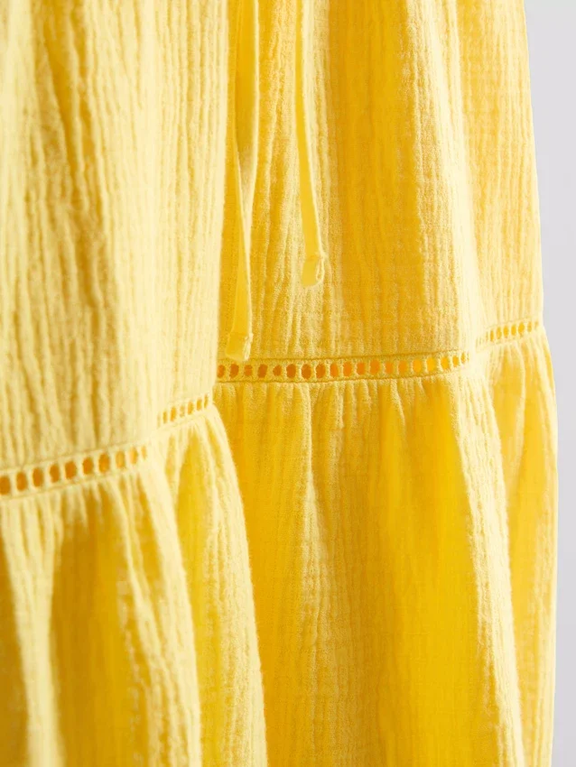 Mini vestido de algodón con cuello en V y volantes