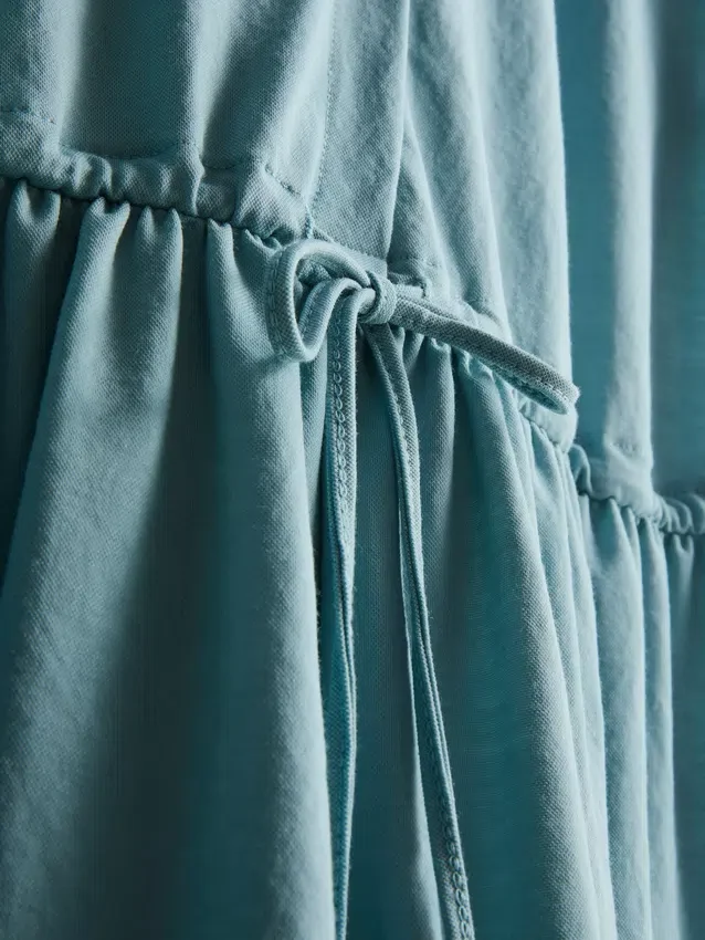Mini vestido de manga corta con volantes