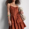 Mini vestido de popelín con volantes y tirantes