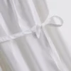 Mini vestido de popelín con volantes y tirantes