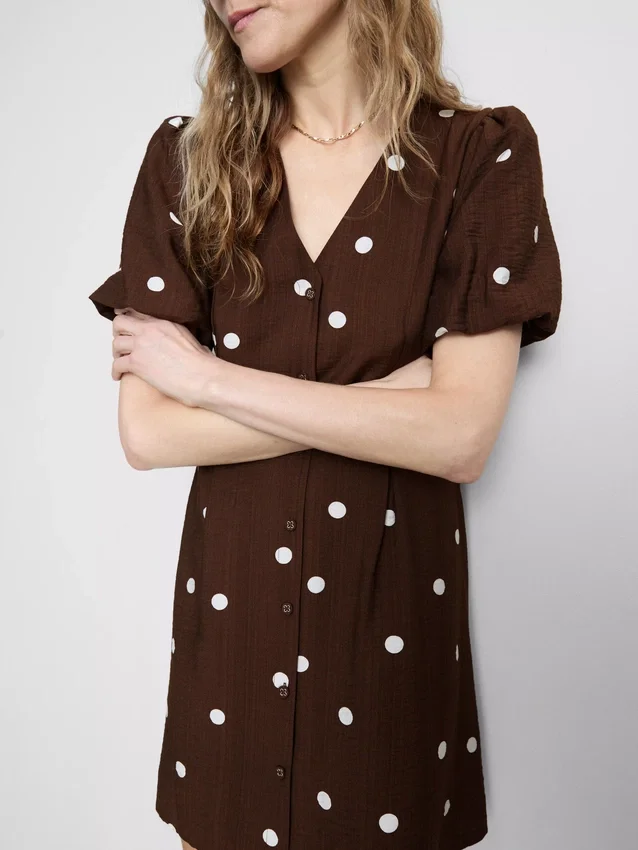 Minivestido con mangas abullonadas y botones