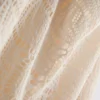 Minivestido halter de croché con cuello vuelto