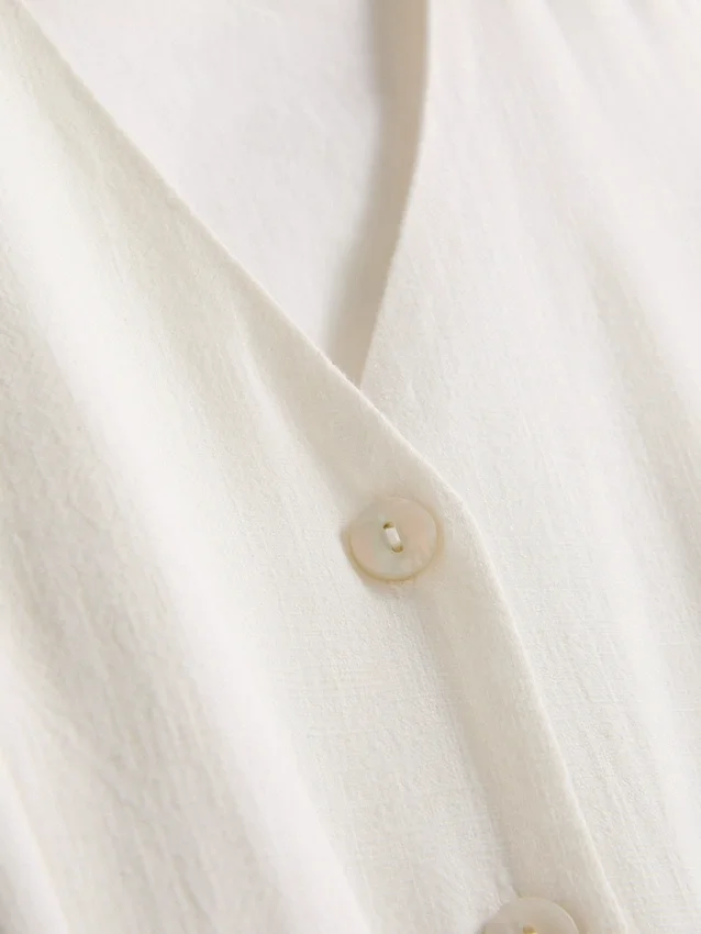 Minivestido sin mangas con cuello en V