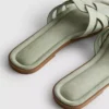 Mules con tiras entrelazadas