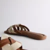 Mules con tiras entrelazadas