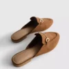 Mules tipo mocasín con detalle de bocado