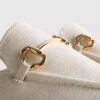 Mules tipo mocasín con detalle de bocado