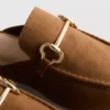 Mules tipo mocasín con detalle de bocado