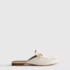 Mules tipo mocasín de imitación de cuero con detalle de bocado de montura