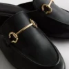 Mules tipo mocasín de imitación de cuero con detalle de bocado de montura