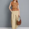 Pantalones acampanados plisados con tacto de papel